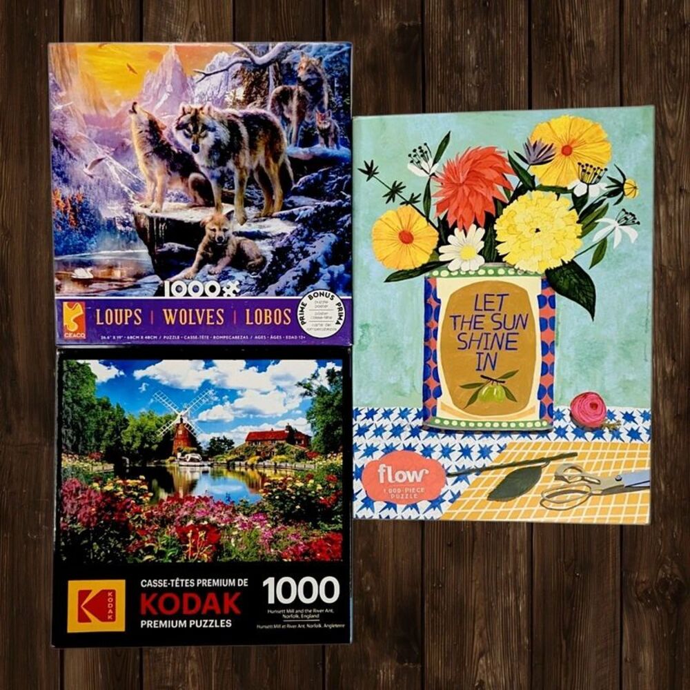 Bundle of three 1000 Piece Jigsaw Puzzles Ceaco Wolves Kodak Norfolk Flow Floral